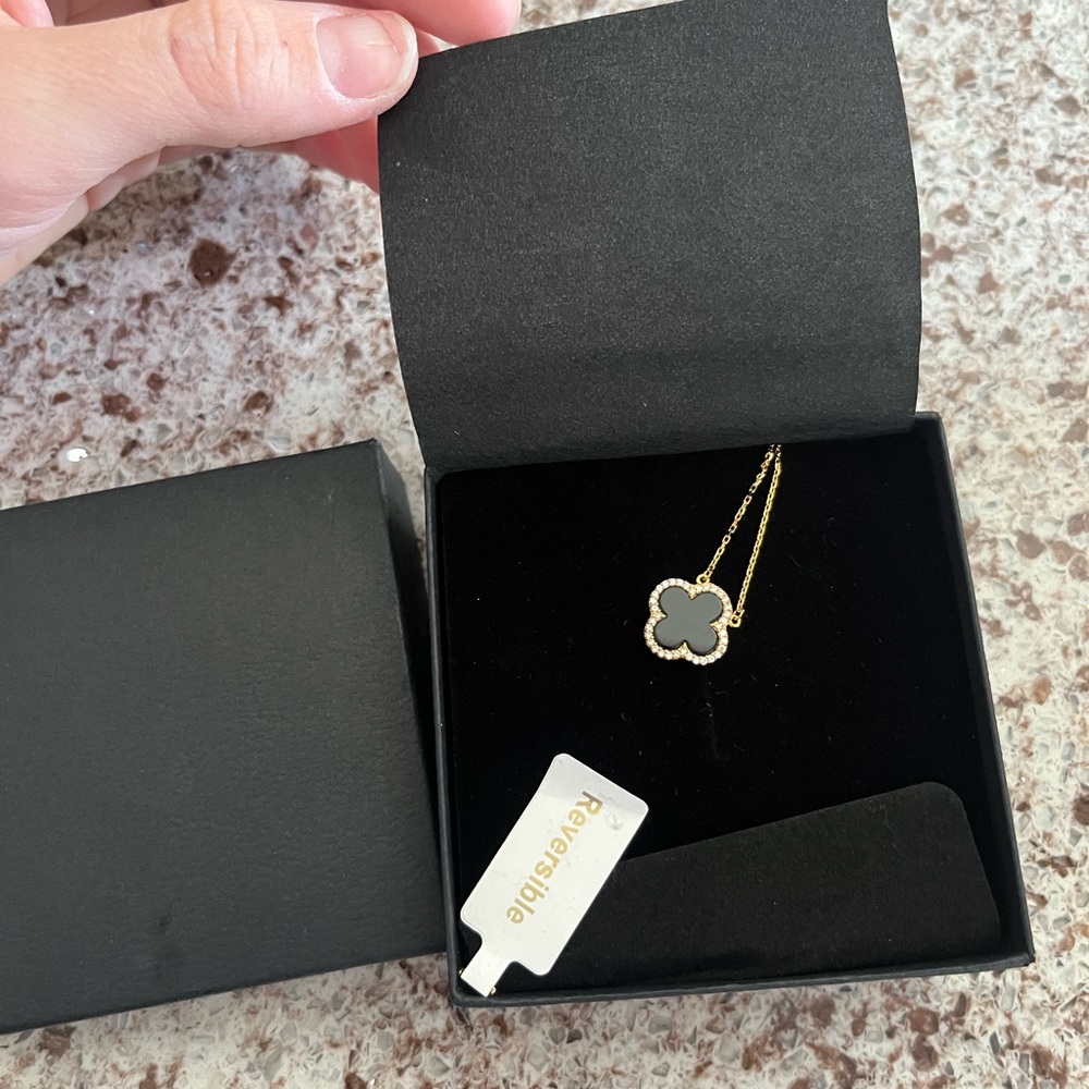 Rachel Zoe Black and Gold Necklace with Clover Pendant